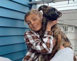 The star has adopted a female dog in her home.